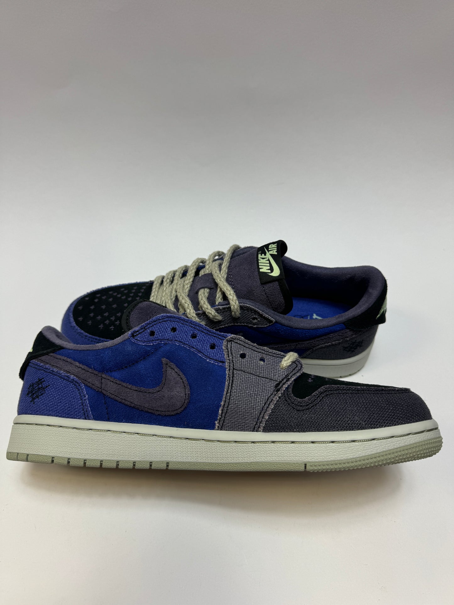 Air Jordan 1 Low Voodoo Alternate linke Außenseite mit Vapor Green und Black Overlays